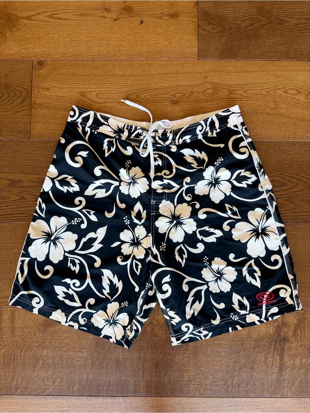 Men's Black Floral Swim Board Shorts with White Hibiscus Print